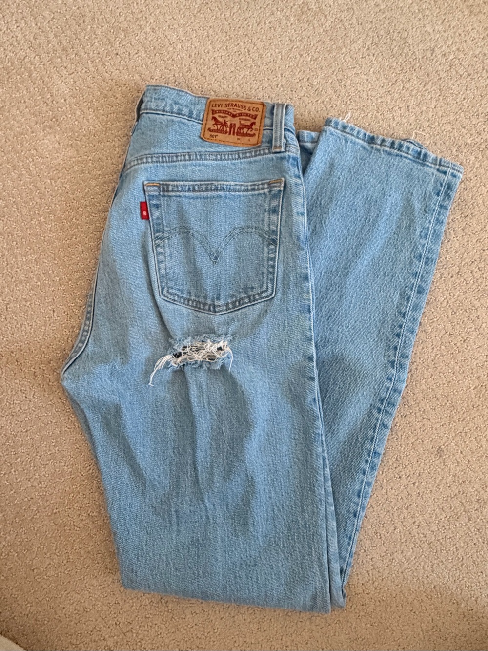 Levi's Light Blue High-Rise Relaxed Jeans with Knee Rip